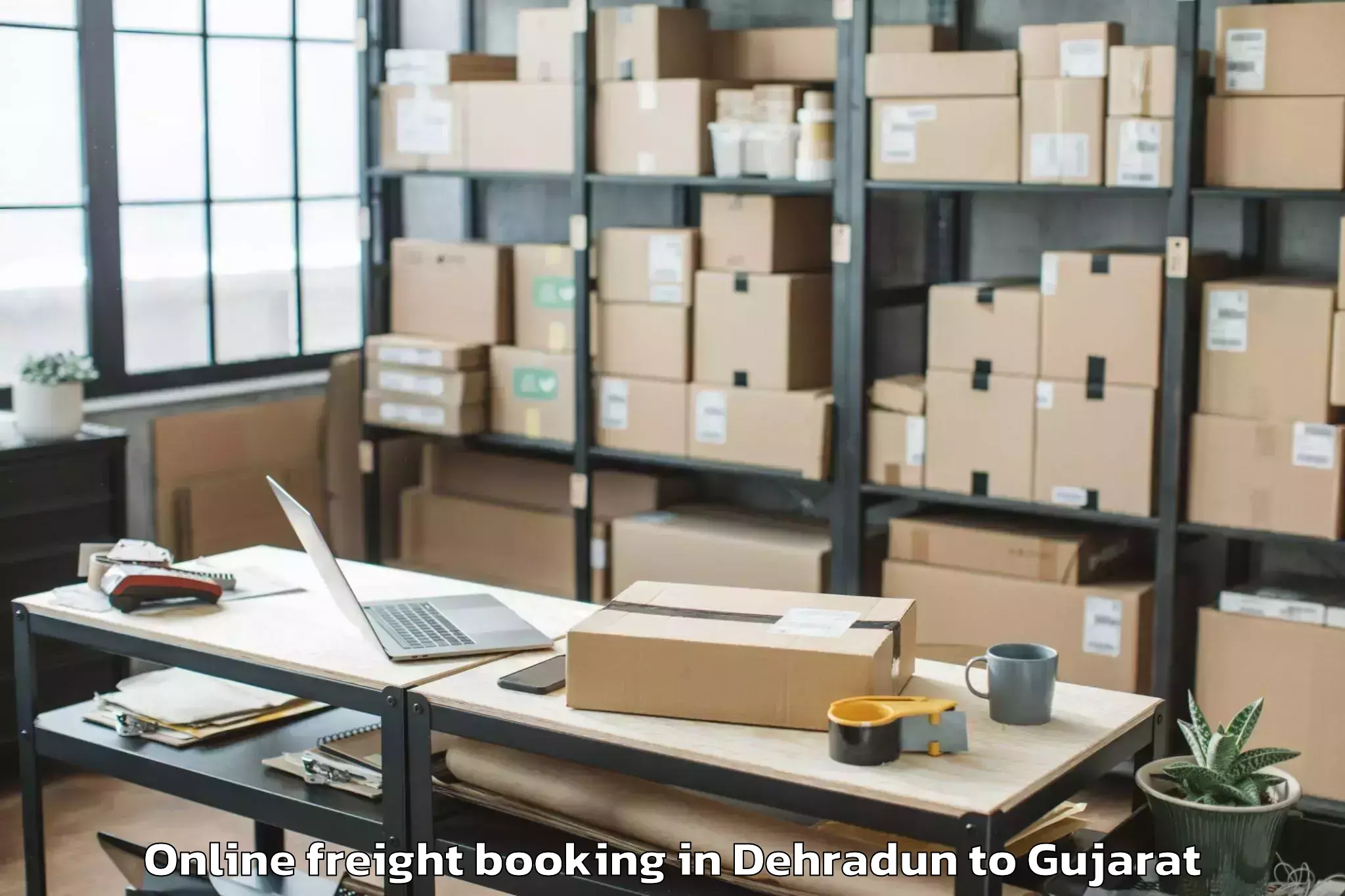 Expert Dehradun to Gussar Online Freight Booking